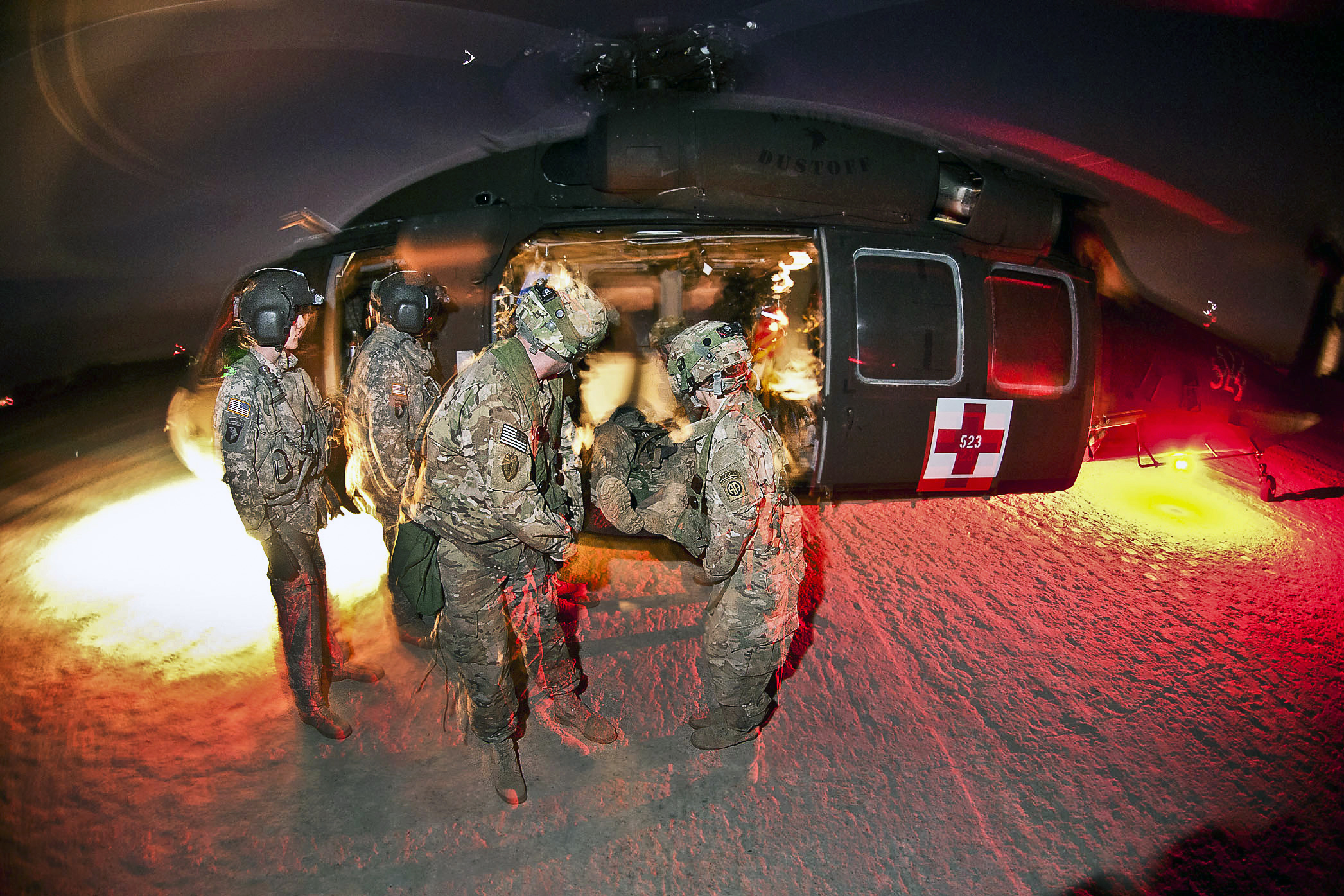 Medics with the 82nd Airborne Division’s 1st Brigade Combat Team retrieve notionally-wounded paratroopers from a Black Hawk medevac helicopter operated by the 101st Airborne Division’s 159th Brigade Jan. 23, 2012, at the Joint Readiness Training Center, Fort Polk, La.